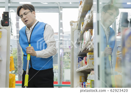 Portrait of young woman and man, part timer and owner 559 62923420