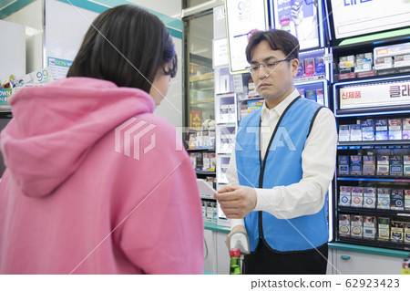 Portrait of young woman and man, part timer and owner 549 62923423