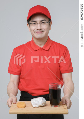 Portrait of young woman and man, part timer and owner 187 62923435