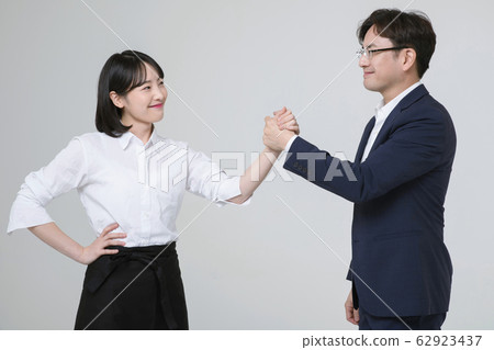 Portrait of young woman and man, part timer and owner 250 62923437