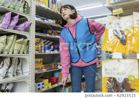 Portrait of young woman and man, part timer and owner 497 62923515