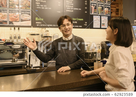 Portrait of young woman and man, part timer and owner 484 62923589