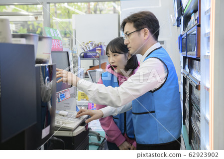 Portrait of young woman and man, part timer and owner 361 62923902