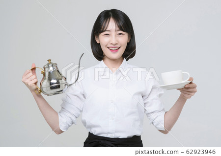 Portrait of young woman and man, part timer and owner 270 62923946