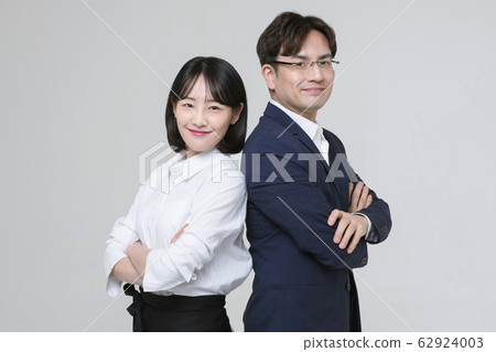 Portrait of young woman and man, part timer and owner 230 62924003