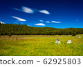 American landscape-green meadow and blue sky 62925803