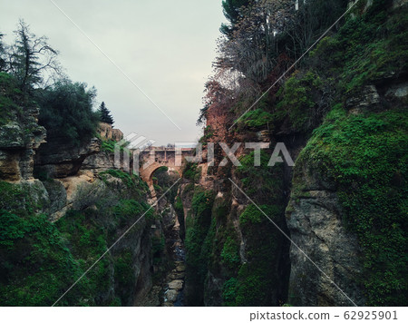 View of rocky canyons and New Bridge of Ronda View of rocky canyons and New Bridge of Ronda 62925901