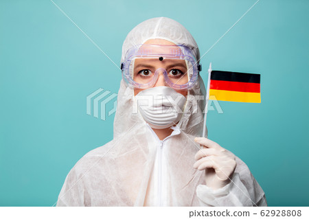 medic woman wearing protective clothing against 62928808