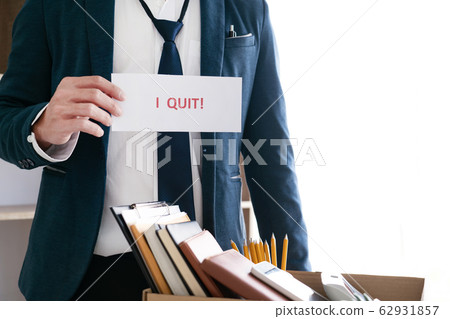Businessman holding with I quit words card letter, Businessman holding with I quit words card letter, 62931857