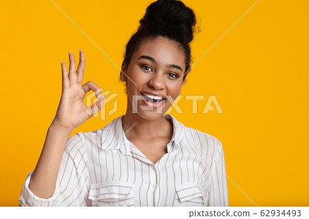 Excited Black Woman Showing Ok Sign And Looking At Camera Excited Black Woman Showing Ok Sign And Looking At Camera 62934493