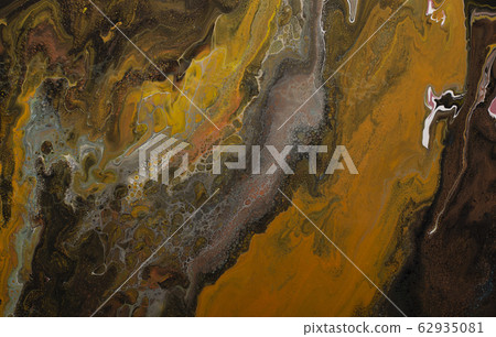 Abstract background of a mixing brown color paints with gold Abstract background of a mixing brown color paints with gold 62935081