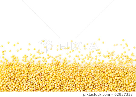 Millet scattered on a white, isolated. Millet 62937332