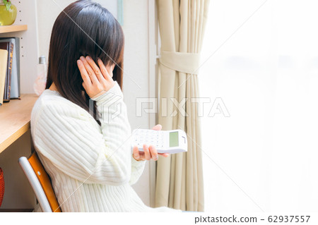 Woman to calculate worried copy space Woman to calculate worried copy space 62937557