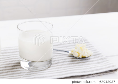 Homemade fermented beverage kefir with kefir grains kefir, or bulgaros, is a fermented milk drink made with kefir grains 62938087