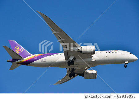 Passenger airplane landing at Bangkok Airport 62939055