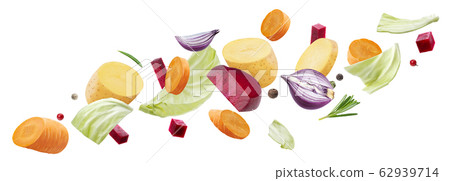 Falling pieces of different vegetables isolated on white background Falling pieces of different vegetables isolated on white background 62939714