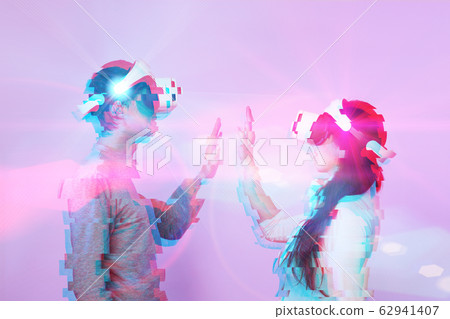 Couple in love communicate using a virtual reality headset. Image with glitch effect. 62941407