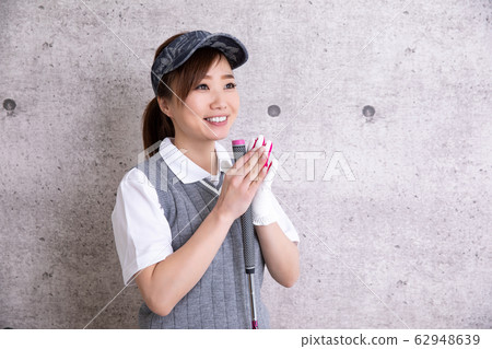 Women in golf wear Women in golf wear 62948639