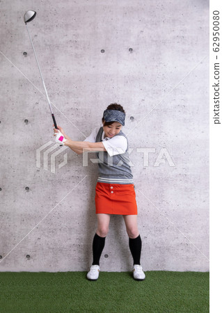 Women in golf wear Women in golf wear 62950080