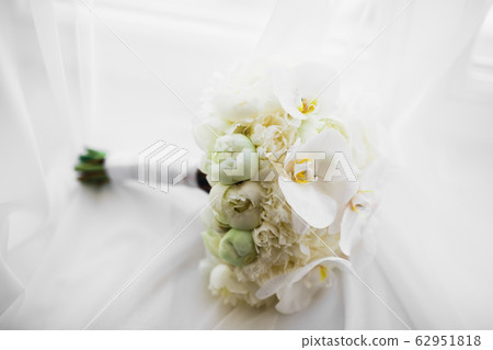 Wonderful luxury wedding bouquet of different flowers Wonderful luxury wedding bouquet of different flowers 62951818