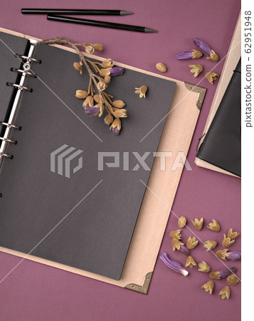 Empty old fashioned black paper notebook. Empty old fashioned black paper notebook. 62951948