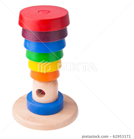 Toy or baby toy wood color pyramid on background Toy or baby toy wood color pyramid on background 62953171