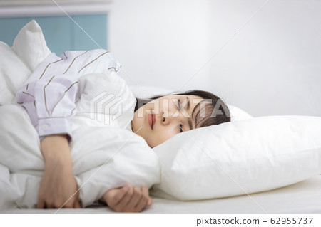 Young woman sleep sleep Young woman sleep sleep 62955737