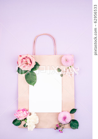 Flower and white card. Flower and white card. 62956533