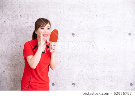 Woman playing table tennis Woman playing table tennis 62956792