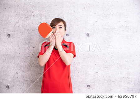 Woman playing table tennis Woman playing table tennis 62956797