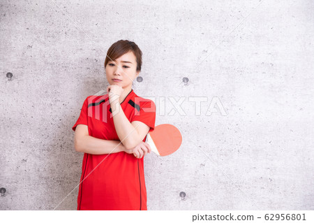 Woman playing table tennis Woman playing table tennis 62956801