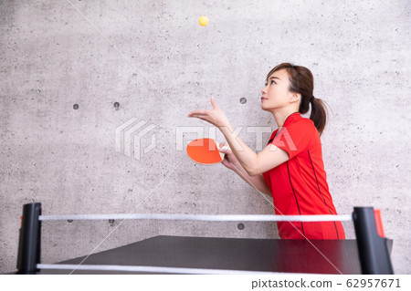 A woman playing table tennis (seriously) 62957671
