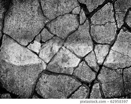 abstract background of texture of dry cracked cement ground on the road 62958397