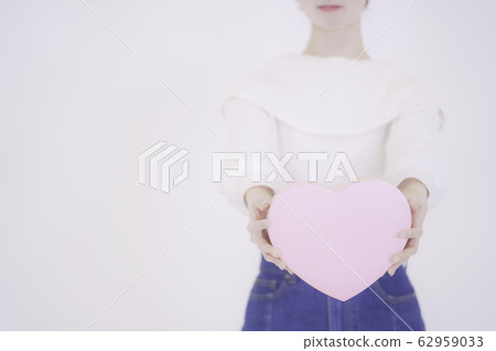 Valentine woman with heart 62959033