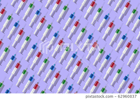 Health-care pattern from colorful vaccine's plastic syrenges. 62960837