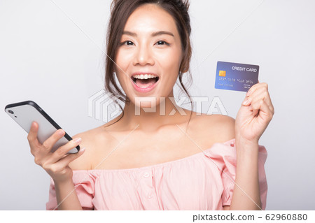 Woman beauty smartphone shopping EC 62960880