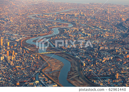 Aerial and evening view of Tokyo (Haneda new route) Aerial and evening view of Tokyo (Haneda new route) 62961448