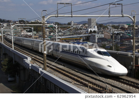 Tokaido Shinkansen N700A going through Odawara city Tokaido Shinkansen N700A going through Odawara city 62962954