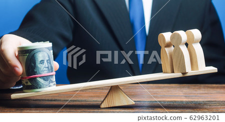 Man outweighs people on scales with a bundle of money. Investing in human capital. Corruption, lack of justice. Violation of legal rights and interests of people. Decent salary pay. Luring Specialists 62963201