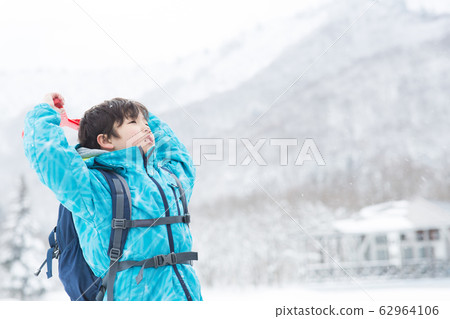 Children enjoying winter 62964106