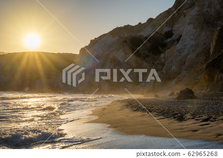 Fyriplaka beach on sunset, Milos island, Cyclades, Greece Fyriplaka beach on sunset, Milos island, Cyclades, Greece 62965268