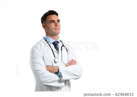 Caucasian male doctor on white background Caucasian male doctor on white background 62968652