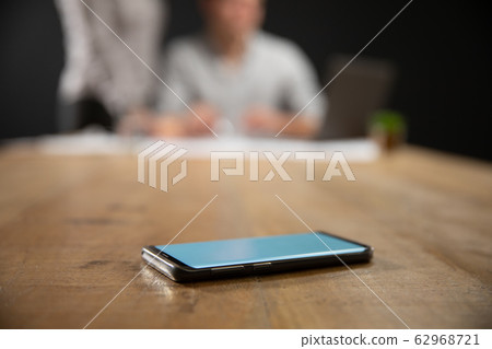 Caucasian man using a smartphone Caucasian man using a smartphone 62968721
