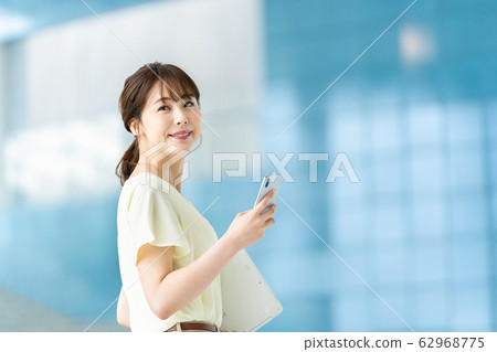 Female employee Business woman Business image Woman working with computer Working woman 62968775