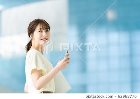 Female employee Business woman Business image Woman working with computer Working woman 62968776
