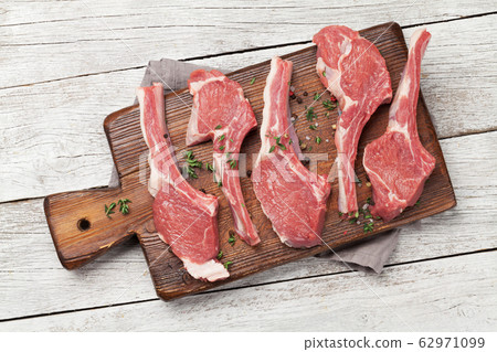 Lamb ribs cooking. Raw rack of lamb Lamb ribs cooking. Raw rack of lamb 62971099