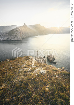 Sunrise at the seaside. View from top of a mountain 62973017