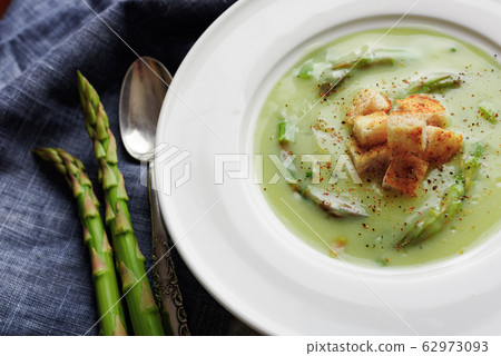 Asparagus soup in white bowl 62973093