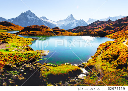 Picturesque view on Bachalpsee lake in Swiss Alps mountains 62973139