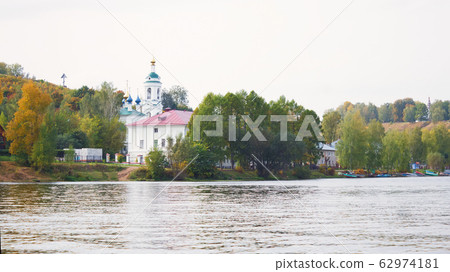 View on russian historical town Plyos on the Volga River from moving cruise ship, Indian summer, autumn landscape 62974181